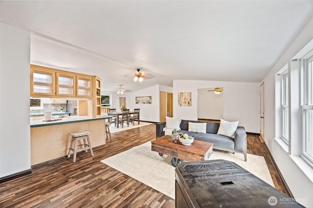11510 Joletta Ave SW, Port Orchard, WA 98367 - living room with dark wood-type flooring, lofted ceiling, ceiling fan, and healthy amount of natural light