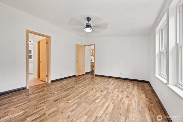 11510 Joletta Ave SW, Port Orchard, WA 98367 - empty room with wood finished floors and ceiling fan