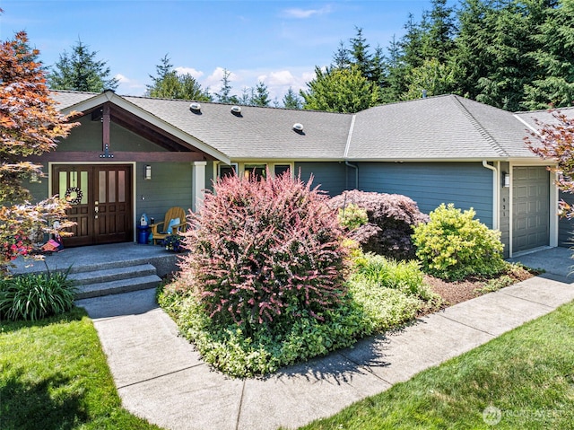 931 SW Moose Hill Ct, Port Orchard, WA 98367 - view of front facade with an attached garage and roof with shingles