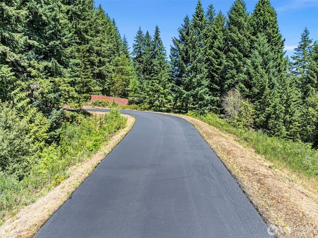 931 SW Moose Hill Ct, Port Orchard, WA 98367 - view of asphalt street featuring a view of trees