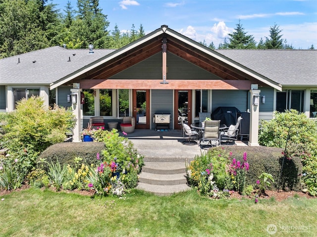 931 SW Moose Hill Ct, Port Orchard, WA 98367 - rear view of property with a shingled roof and a lawn