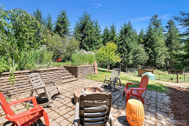 931 SW Moose Hill Ct, Port Orchard, WA 98367 - view of patio with an outdoor fire pit