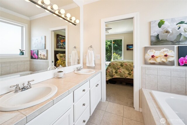 8206 66th Avenue Ct E, Puyallup, WA 98371 - full bathroom featuring ornamental molding, double vanity, ensuite bathroom, a garden tub, and tile patterned flooring