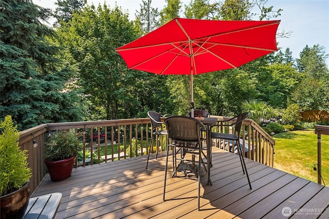 8206 66th Avenue Ct E, Puyallup, WA 98371 - wooden deck with outdoor dining space and a yard