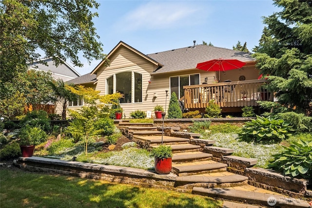 8206 66th Avenue Ct E, Puyallup, WA 98371 - rear view of house featuring roof with shingles and a wooden deck