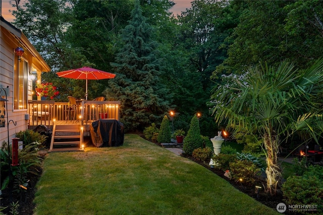 8206 66th Avenue Ct E, Puyallup, WA 98371 - yard at dusk with a yard and a deck