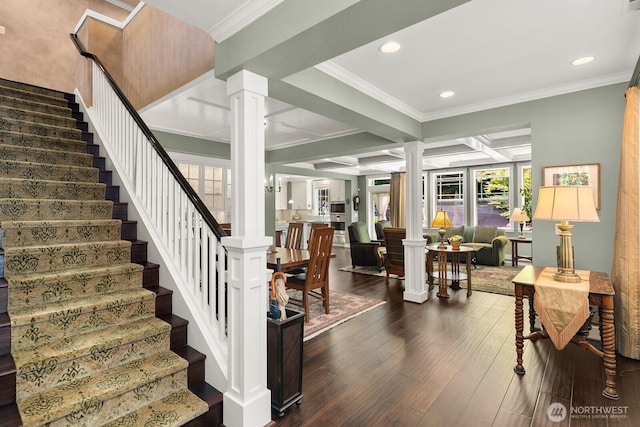 3913 W Briarcliff Ln, Seattle, WA 98199 - stairway featuring decorative columns, hardwood / wood-style flooring, crown molding, recessed lighting, and beam ceiling