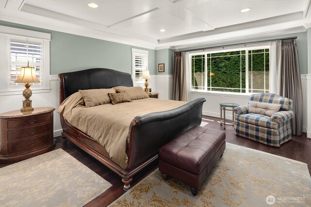 3913 W Briarcliff Ln, Seattle, WA 98199 - bedroom with coffered ceiling, multiple windows, wood finished floors, a wainscoted wall, and recessed lighting