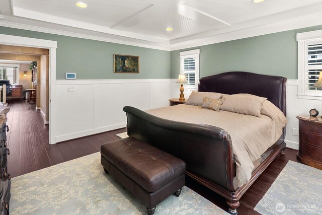 3913 W Briarcliff Ln, Seattle, WA 98199 - bedroom featuring a wainscoted wall, dark wood-style flooring, beam ceiling, recessed lighting, and coffered ceiling