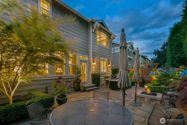 3913 W Briarcliff Ln, Seattle, WA 98199 - back of house with a patio, an outdoor fire pit, and outdoor dining area