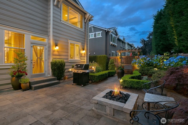 3913 W Briarcliff Ln, Seattle, WA 98199 - view of patio / terrace featuring area for grilling and an outdoor fire pit