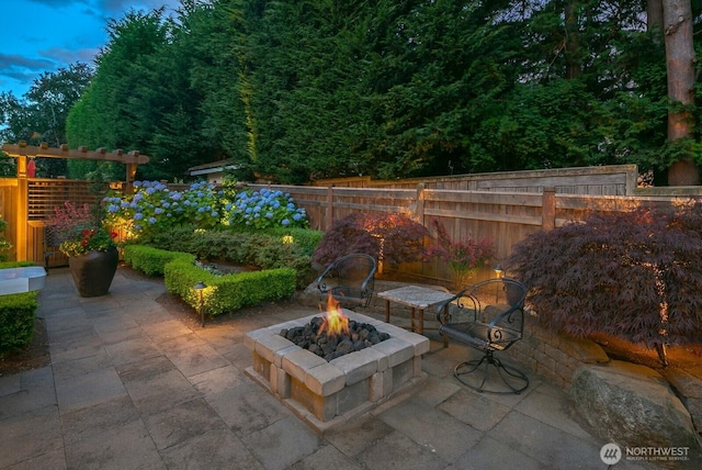 3913 W Briarcliff Ln, Seattle, WA 98199 - view of patio featuring a fire pit