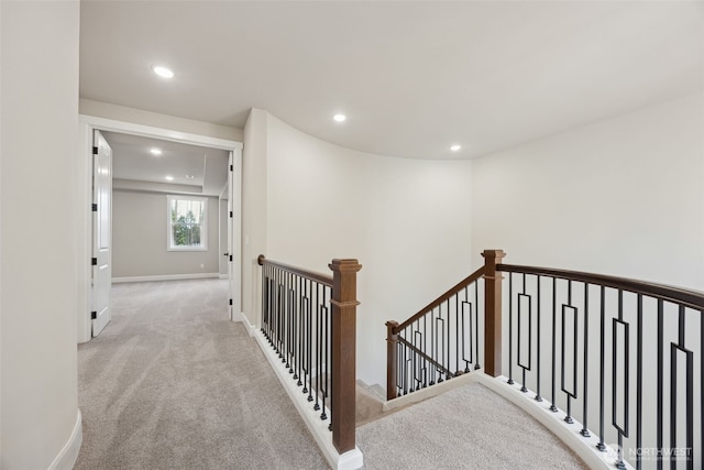 13620 100th St NE Unit 211, Lake Stevens, WA 98258 - hall featuring an upstairs landing, carpet floors, and recessed lighting