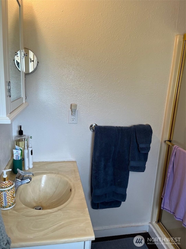 1205 49th St, Seaview, WA 98644 - bathroom featuring vanity and an enclosed shower