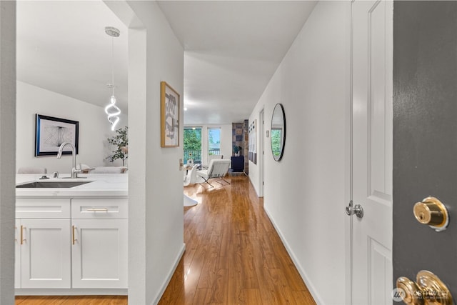 6347 137th Ave NE Unit 262, Redmond, WA 98052 - corridor featuring light wood-style floors
