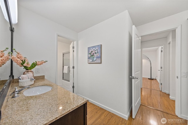 6347 137th Ave NE Unit 262, Redmond, WA 98052 - bathroom with wood finished floors and vanity