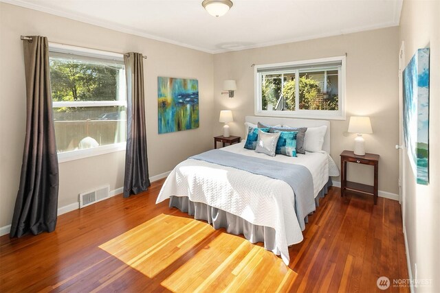 13316 30th Ave NE, Seattle, WA 98125 - bedroom with wood finished floors and crown molding