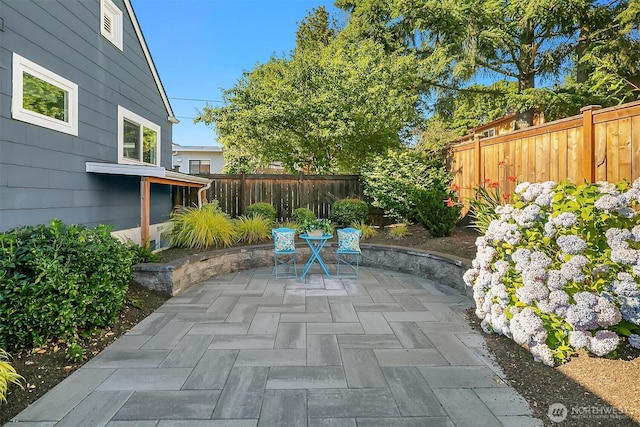 13316 30th Ave NE, Seattle, WA 98125 - fenced backyard with a patio