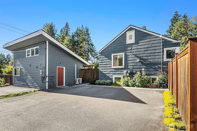 13316 30th Ave NE, Seattle, WA 98125 - view of side of property featuring a patio