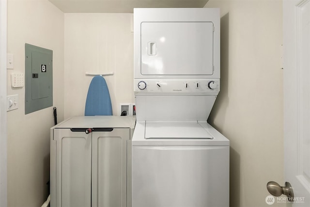 13316 30th Ave NE, Seattle, WA 98125 - washroom featuring electric panel and stacked washer / dryer