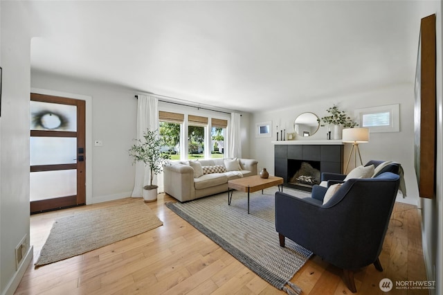 533 Craig St, Walla Walla, WA 99362 - living area with a tile fireplace and light wood-type flooring