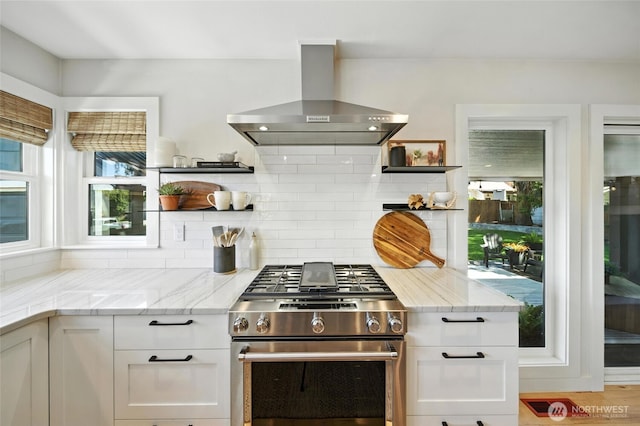 533 Craig St, Walla Walla, WA 99362 - kitchen with wall chimney range hood, high end stainless steel range oven, open shelves, and white cabinets