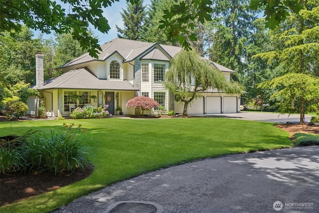 1800 SE 202nd Ave, Camas, WA 98607 - view of front facade featuring asphalt driveway, an attached garage, a chimney, and a front lawn
