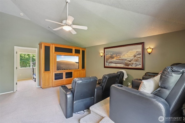 1800 SE 202nd Ave, Camas, WA 98607 - cinema room featuring lofted ceiling, light carpet, ceiling fan, and a textured ceiling