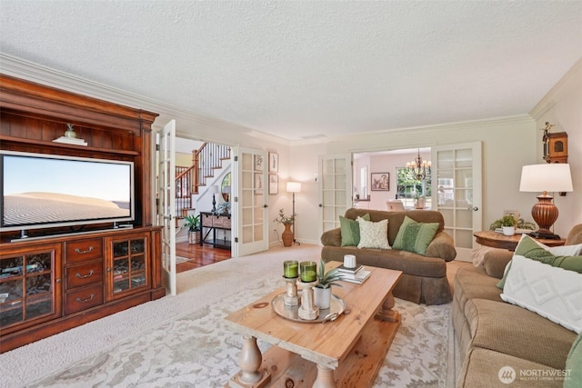 1800 SE 202nd Ave, Camas, WA 98607 - carpeted living room with crown molding, stairway, a textured ceiling, and a chandelier