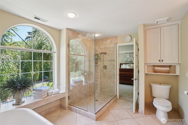1800 SE 202nd Ave, Camas, WA 98607 - ensuite bathroom featuring a stall shower, a freestanding tub, and tile patterned floors