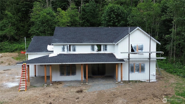40440 306th Ave SE, Enumclaw, WA 98022 - modern inspired farmhouse with a shingled roof and a forest view