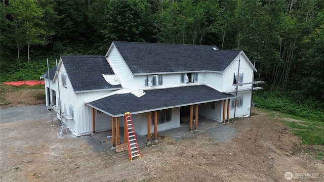 40440 306th Ave SE, Enumclaw, WA 98022 - view of front of home with a shingled roof, a forest view, and dirt driveway