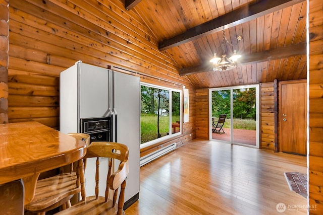 44111 SE Mt Si Rd, North Bend, WA 98045 - dining room with baseboard heating, wood ceiling, light wood-style floors, and a chandelier