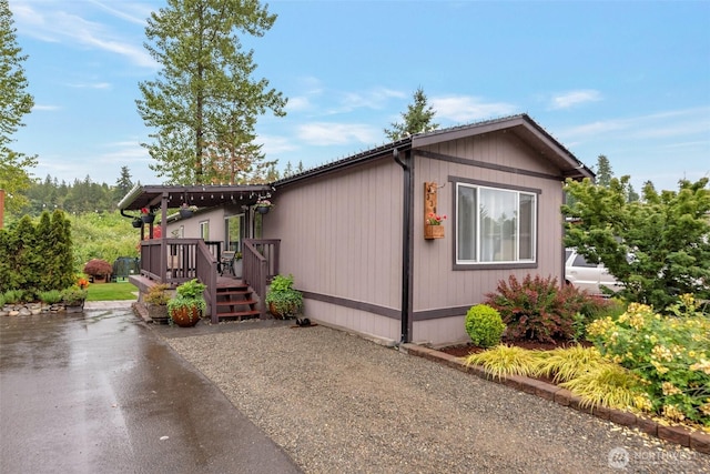 31108 3rd Ave Unit 330, Black Diamond, WA 98010 - view of home's exterior with a deck