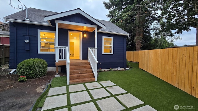744 N 88th St, Seattle, WA 98103 - view of front of house featuring roof with shingles