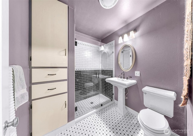 105 Shuksan St, Everson, WA 98247 - bathroom featuring a shower stall and tile patterned flooring