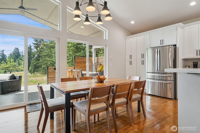 1738 Lilypad Pl E, Port Orchard, WA 98366 - dining room with lofted ceiling, plenty of natural light, light wood-style floors, recessed lighting, and a ceiling fan
