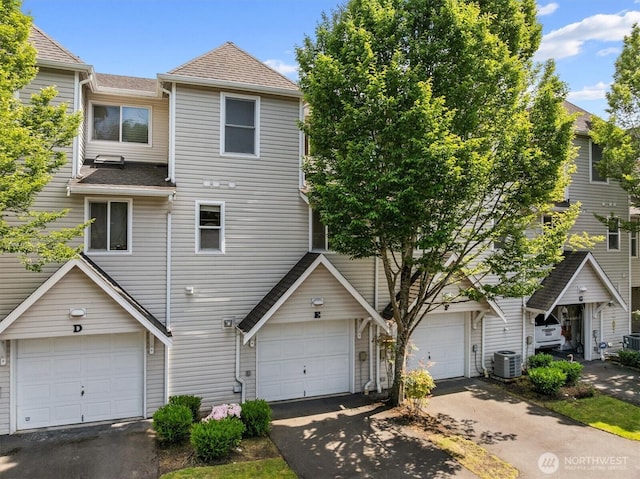 2311 Milton Way Unit E, Milton, WA 98354 - multi unit property featuring a shingled roof and driveway