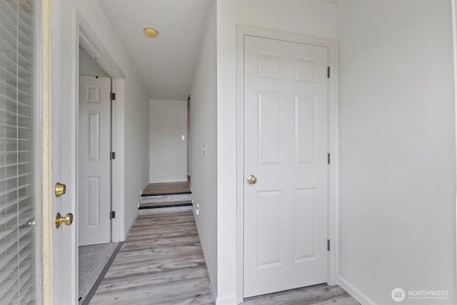 2311 Milton Way Unit E, Milton, WA 98354 - corridor with light wood-type flooring and baseboards