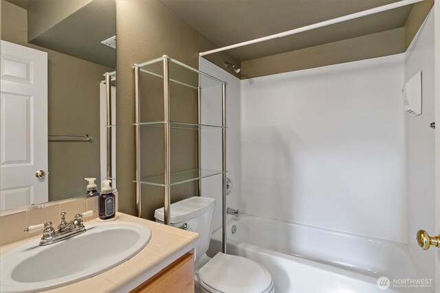 2311 Milton Way Unit E, Milton, WA 98354 - bathroom featuring vanity and washtub / shower combination