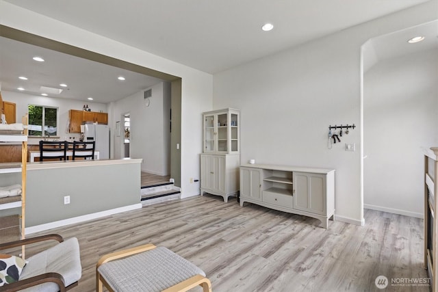 2311 Milton Way Unit E, Milton, WA 98354 - living area with light wood-style floors and recessed lighting