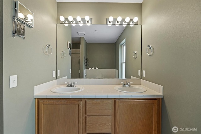 2311 Milton Way Unit E, Milton, WA 98354 - bathroom featuring double vanity