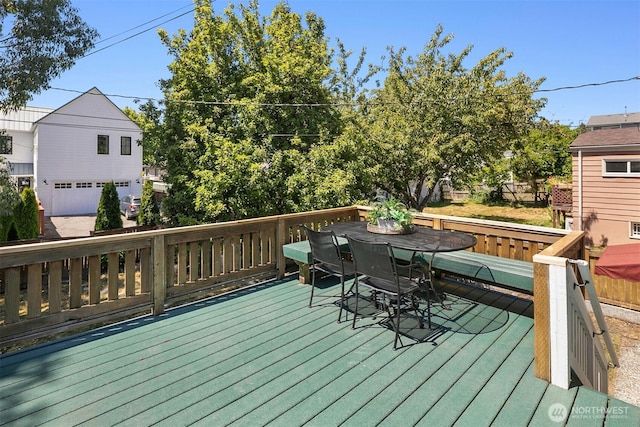 4521 47th Ave SW, Seattle, WA 98116 - wooden terrace with outdoor dining area