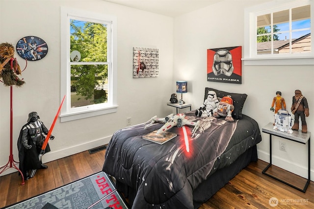 4521 47th Ave SW, Seattle, WA 98116 - bedroom featuring wood finished floors and baseboards