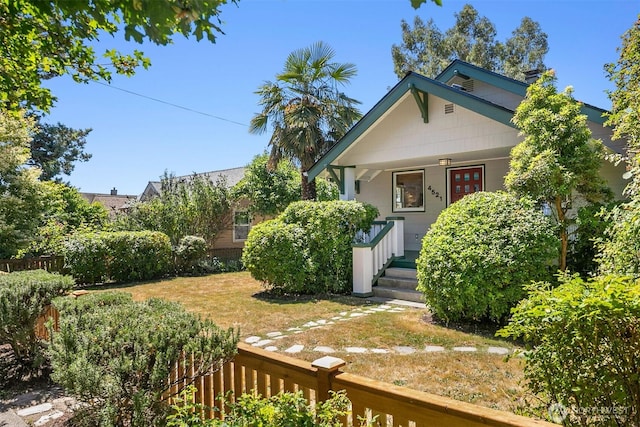 4521 47th Ave SW, Seattle, WA 98116 - view of front of home featuring a porch and a chimney