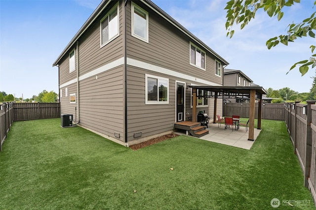 14717 73rd St E, Sumner, WA 98390 - rear view of house featuring a fenced backyard, a patio, and a gazebo