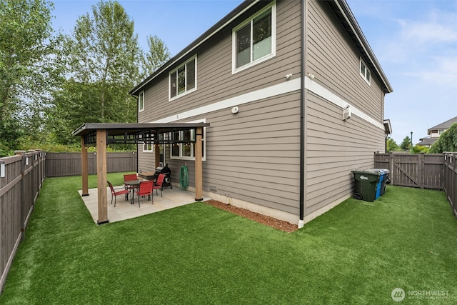14717 73rd St E, Sumner, WA 98390 - rear view of house with a fenced backyard, a patio area, and a gate