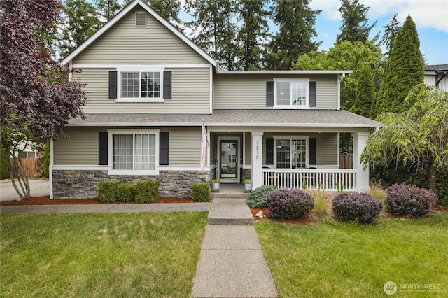 1818 Fisher Ave, Dupont, WA 98327 - view of front of property with a front lawn, covered porch, roof with shingles, and stone siding