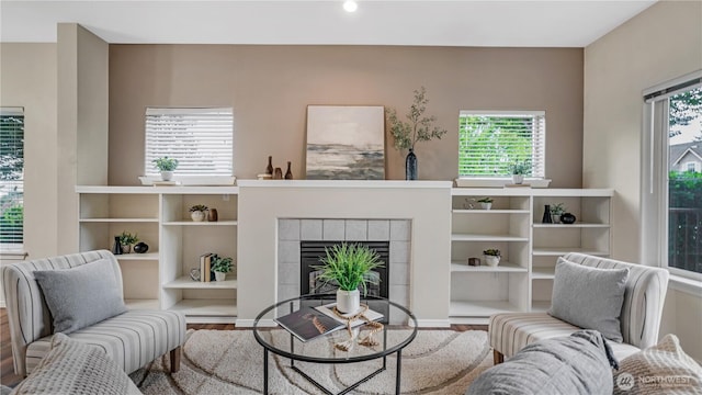 2104 Palisade Blvd Unit B-7, Dupont, WA 98327 - living room featuring wood finished floors, a tile fireplace, and recessed lighting