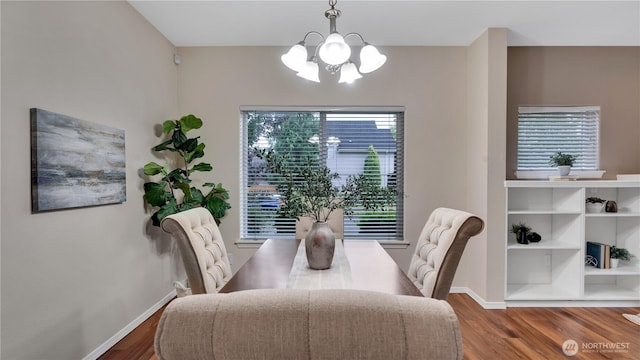 2104 Palisade Blvd Unit B-7, Dupont, WA 98327 - dining room with a chandelier and wood finished floors